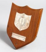 A TEAK AND SILVER SHIELD, Indian Army Medical Services badge, 6ins