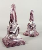 A PAIR OF SLAG GLASS MARBLE OBELISKS. 8ins high.