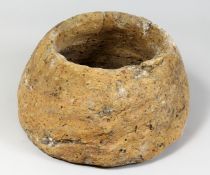 AN UNUSUAL CARVED SANDSTONE BOWL OR PLANTER. 14ins diameter