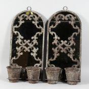A PAIR OF PATINATED METAL, MIRROR BACK WALL HANGING, POT HOLDERS. 2ft high x 1ft wide.