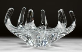 A GOOD BACCARAT HEAVY OCTAGONAL SHAPED BOWL with curving waves. Printed mark, 10ins diameter.