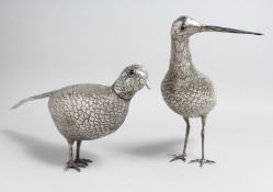 A PAIR OF LARGE CONTINENTAL SILVER BIRD, TABLE ORNAMENTS. CURLEW, 11ins long, PHEASANT 17.5ins long,