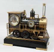 AN UNUSUAL INDUSTRIAL STYLE CLOCK WITH BAROMETER AND THERMOMETER, modelled as a steam train, on a