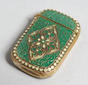 A BRASS AND ENAMEL VESTA