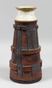 A TAPERING POTTERY VASE. 14ins high.