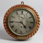 A GOOD OAK CASED CIRCULAR CLOCK with silvered dial, 7.5ins diameter, presented to Officers RAMC,