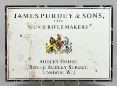 AN ENAMEL ADVERTISING SIGN FOR THOMAS PURDEY & SONS, LONDON. 23.75ins x 16.75ins.