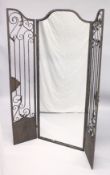 AN EXTERIOR WROUGHT IRON GARDEN MIRROR with folding screen. 60ins high x 24ins wide (closed).