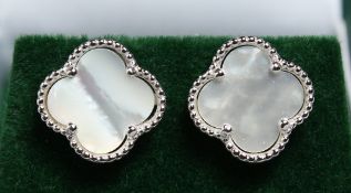 A PAIR OF SILVER AND MOTHER OF PEARL EARRINGS.