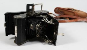 A 1934 ART DECO KODAK SIX 20 MODEL C. FOLDING CAMERA.