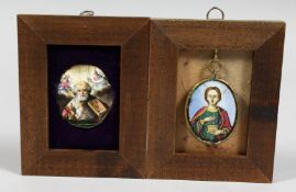 A PAIR OF EARLY RUSSIAN OVAL ENAMEL ICONS. 5cm x 5cm framed.