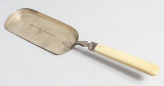A SILVER CRUMB SCOOP with bone handle, London, 1907, engraved RAMC MESS, NETLEY.
