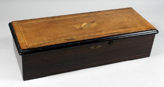 A GOOD 19TH CENTURY ROSEWOOD CASED MUSICAL BOX playing 10 arias, No.6533 with labels. 22ins long.