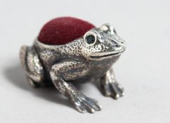 A SILVER FROG PIN CUSHION,
