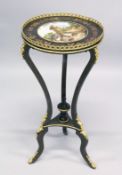 A FRENCH STYLE CIRCULAR MARQUETRY AND ORMOLU GEURIDON, inset with a porcelain bowl, painted with a