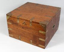 A LATE 19TH CENTURY BRASS MILITARY STYLE CAMPHORWOOD BOX, with lockable dropdown front and inset