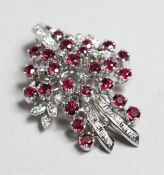 AN 18CT WHITE GOLD, DIAMOND AND RUBY SPRAY BROOCH, 1.5ins.