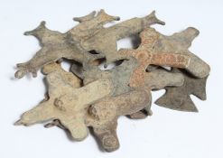 TEN LARGE ROMAN IRON CROSSES. 2.75ins long.