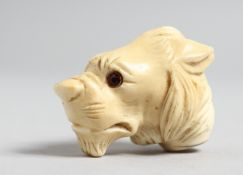 AN IVORY CARVED DUCK'S HEAD HANDLE. 2ins.