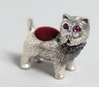 A SILVER SCOTTIE DOG PIN CUSHION.