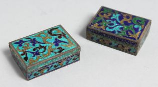 A PAIR OF BRASS AND ENAMEL PILL BOXES.