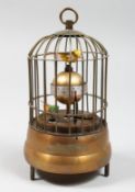 A NOVELTY BIRD CAGE CLOCK 7ins high.