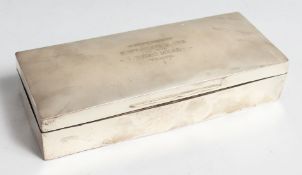 A RECTANGULAR SILVER CIGARETTE BOX, 9ins wide, cedarwood liner, London, 1909, Mappin & Webb.