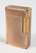 A DUPONT GILT LIGHTER, No. 5388, 2.25ins in original box.