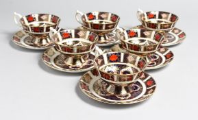 A SET OF SIX ROYAL CROWN DERBY OLD IMARI PATTERN CUPS AND SIX SAUCERS, NO. 1128.