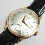 A GENTLEMAN'S LONGINES GOLD FILLED AUTOMATIC WRISTWATCH, with silvered dial, button numeral, sweep