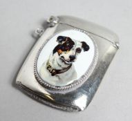 A 1906 CHESTER SILVER AND ENAMEL DOG'S HEAD VESTA.