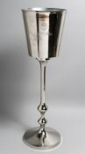 AN ICE BUCKET on pedestal stand, 32ins high.