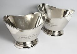 A PAIR OF TWIN HANDLED OVAL PLATED WINE COOLERS, 14ins wide.