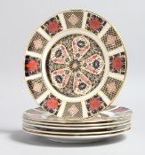 A SET OF SIX LARGE ROYAL CROWN DERBY OLD IMARI PATTERN TEA PLATES, NO. 1128. 6ins diameter.