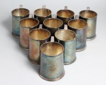 A SET OF TEN ELKINGTON SILVER PLATE PINT MUGS, RAMC, all with engraved inscription on base.