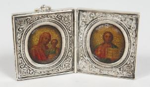 A TRAVELLING SILVER FOLDING ICON by Alexi Marialkov and dated 1898. 5cm x 5cm closed.