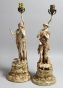 A PAIR OF ROYAL DUX PORCELAIN FIGURAL LAMP BASES one as a boy shepherd, the other a female with a