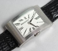A GOOD 18CT WHITE GOLD BOUCHERON WATCH with leather strap, no. 090 6233.