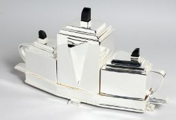 AN ART DECO PLATED THREE PIECE TEAPOT ON STAND, 15ins long.