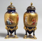 A VERY GOOD PAIR OF VIENNA VASES, COVERS AND UNUSUAL THREE CURVING LEG BASES, 