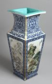 A GOOD LARGE CHINESE TAPERING SQUARE VASE each side painted with a landscape. 17.5ins high.