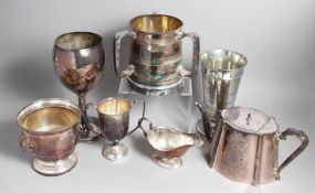 A LARGE MAPPIN AND WEBB VICTORIAN ENGRAVED TEA POT, A SAUCE BOAT, A TWO HANDLED CHALLENGE CUP, A