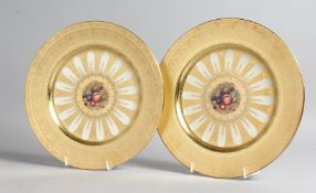 A GOOD PAIR OF AYNSLEY FRUIT PLATES with gold borders. 10ins diameter.