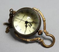 A SMALL BALL SHAPED PENDANT WATCH
