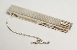 A GUCCI .925 SILVER TIE CLIP in a velvet purse and black box.