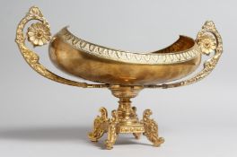 A DECORATIVE CLASSICAL STYLE GILT BRONZE TWIN HANDLED PEDESTAL OVAL SHAPE BOWL. 15.5ins high.