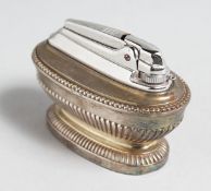 A RONSON, QUEEN ANNE SILVER GAS TABLE LIGHTER.