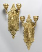 A GOOD PAIR OF GILT BRONZE TWIN BRANCH WALL LIGHTS, the two candle sconces held aloft by a female