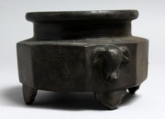 A BRONZE CENSOR WITH SILVER WARE INLAID DECORATION. 5ins wide.