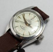 A LADIES TUDOR OYSTER PRINCESS WRIST WATCH with leather strap.